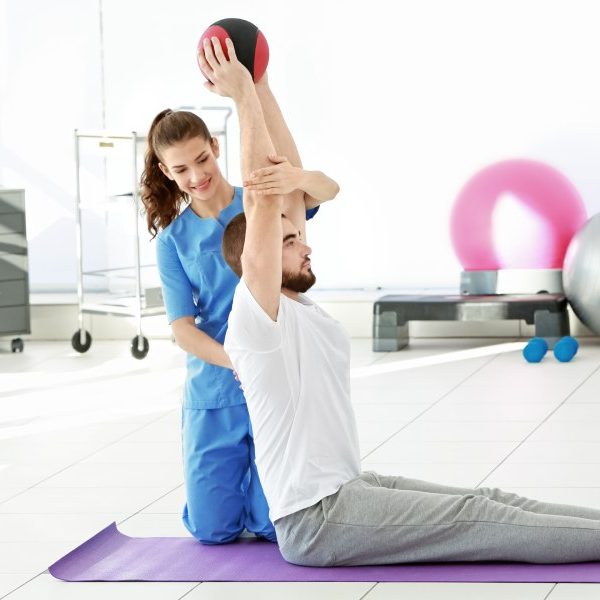 Osteopath treating a patient
